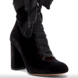Chloe Harper black velvet lace up boots.